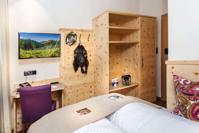 Double room in Swiss pine design at Hotel Talblick in Hinterglemm